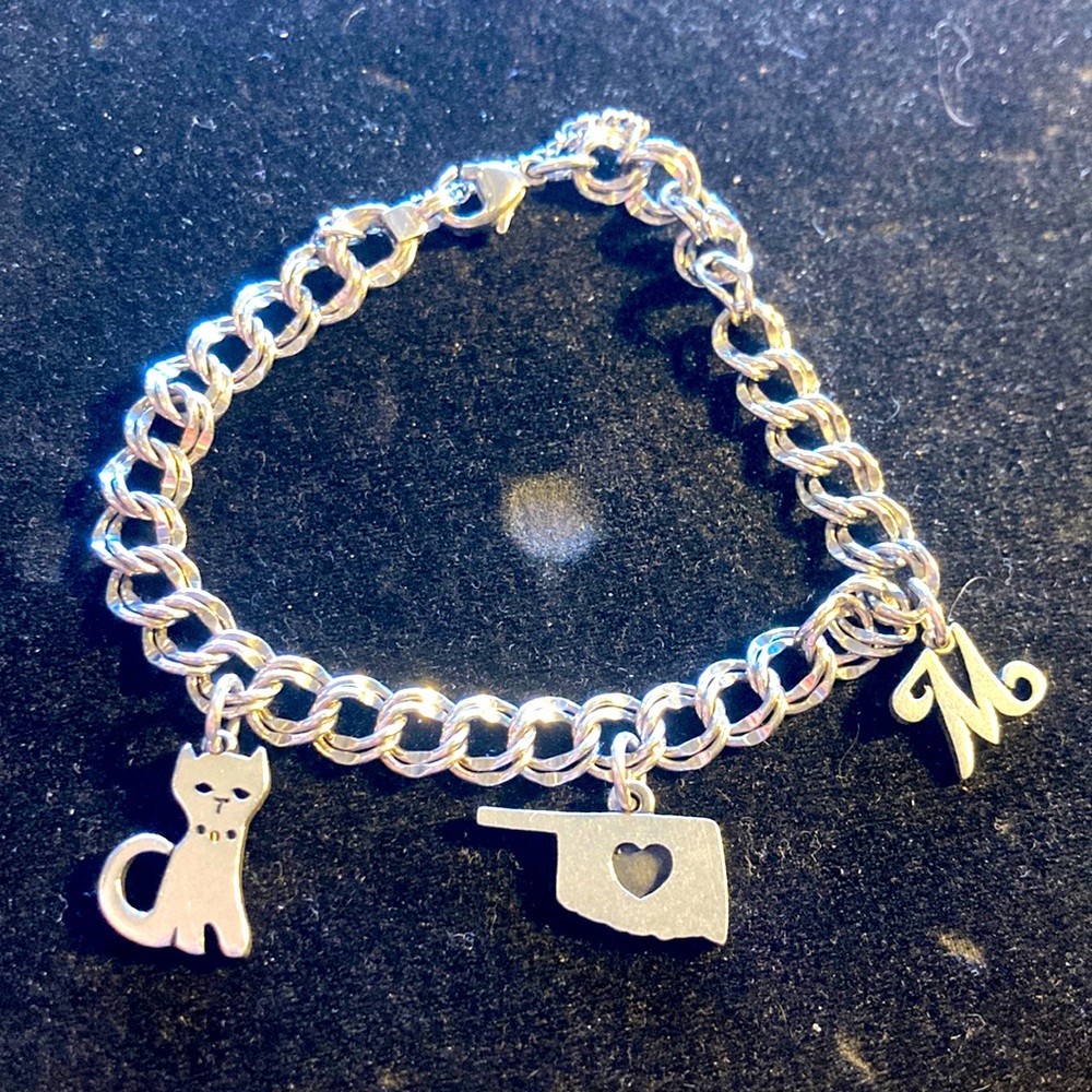 James Avery bracelet with three charms
